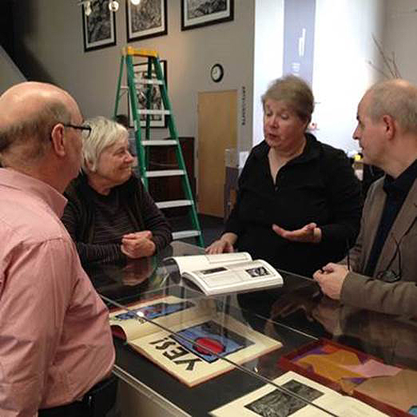 Click the image for a view of: Jack with Claire Van Vliet and Kathleen Burch, co-founder of Center for the Book, SF, showing the exhibition catalogue with Paul van Capelleveen, director of The National Library of the Netherlands